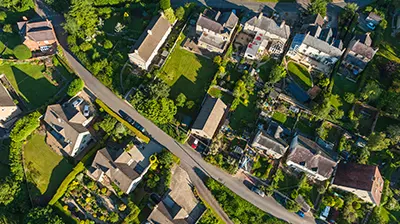 Applied Home  Birds eye view of suburban neighborhood
