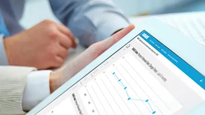 IVANS Index: Premium Renewal Rate Index Two people reviewing analytics on a tablet